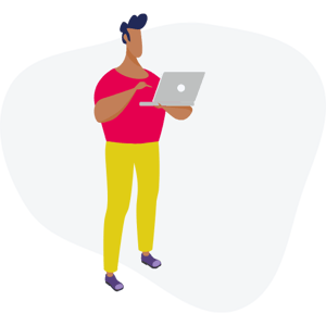 Man standing with a laptop